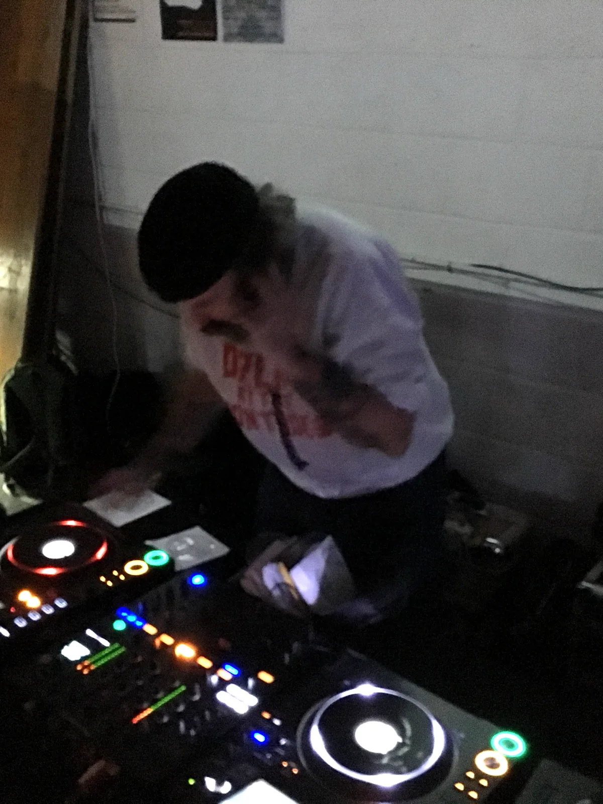 Andy Weatherall DJing on the Scruff Bag Sound System decks